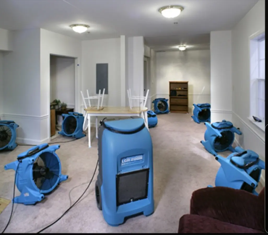 Air movers and dehumidifier setup for Water Damage Restoration in Hermantown